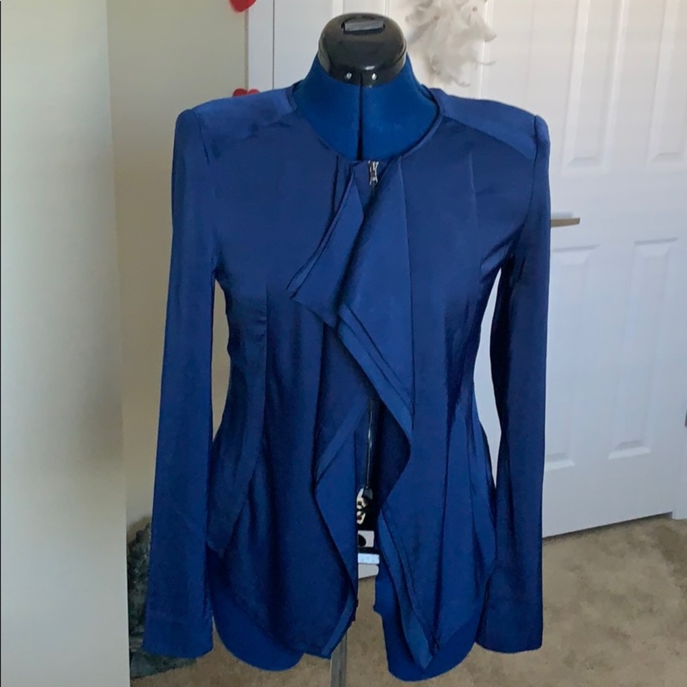 Beautiful blue jacket, material feels amazing